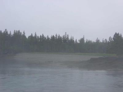 A fog covered beach on the return ferry trip