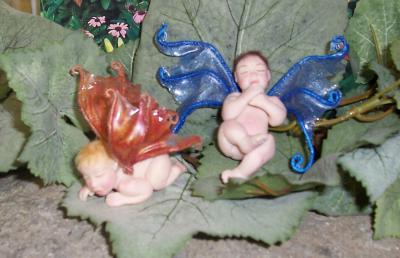 Brown Hair Baby Fairy with blue wings  ($30.00) (Blond is sold)