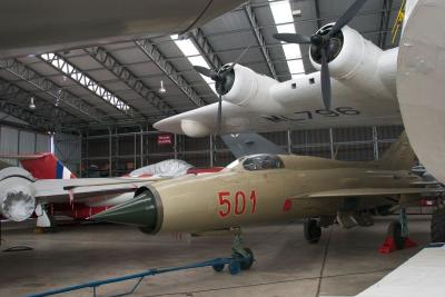 MiG-21 beneath the Sutherland's starboard wing