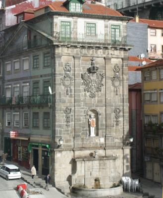 A shrine built into the side of a building