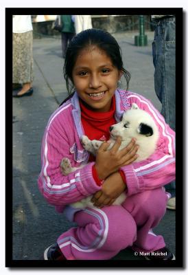 Girl with ther Puppies, Plaza Mayor Lima, Peru