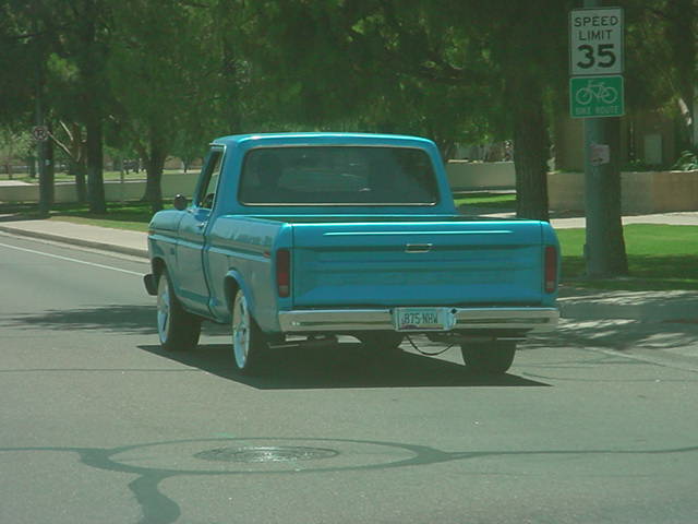 blue Ford F-100<br>with beautiful mags