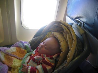This is the way tay spent most of our plane ride both ways