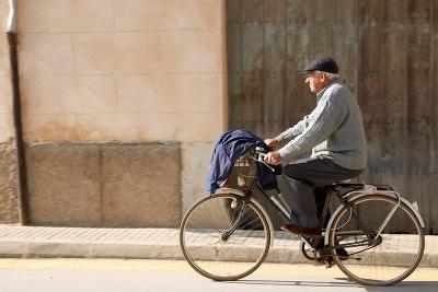 Man on bicycle, Pollenca, Spain