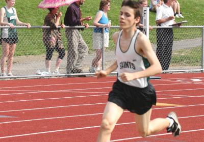 Beginning of 3rd lap in the 1600 meter run, D. Busby