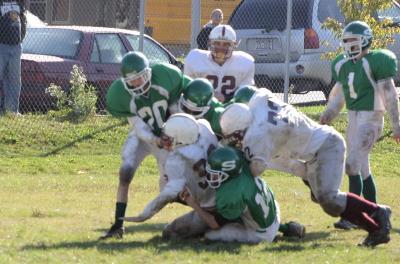 Luke Daly getting some help stopping the RB