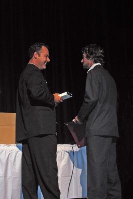 Mark gets his diploma! (nice suit)
