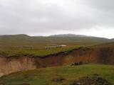 A fissure in the earth. Iceland is the newest body of land on Earth.