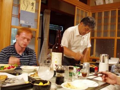 Abe-sensei prepares another batch of gyooza while Mike L. gets redfaced from a little too much of Abe's homemade umeshu