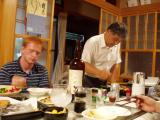 Abe-sensei prepares another batch of gyooza while Mike L. gets redfaced from a little too much of Abes homemade umeshu