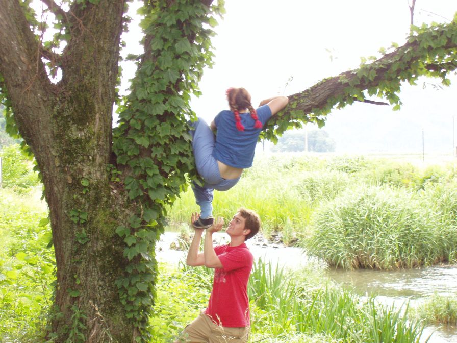 June 20 - On our way to the water tunnel, Jocelyn decides a tree climbing break is in order