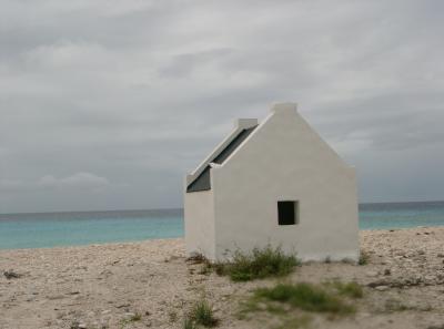 White slave huts on the beach