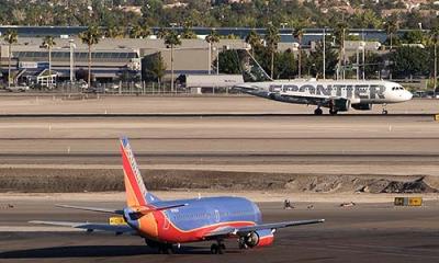 Southwest Airlines B737 and Frontier Airlines A319-111 N928FR aviation stock photo #0869