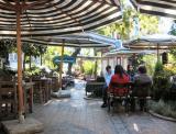 The Green Corner cafe - table at right was<br>overturned later by a thief running from pursuers.