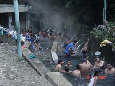 Bathing in hot water pool