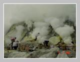 Miner waiting to load in thick pungent smoke