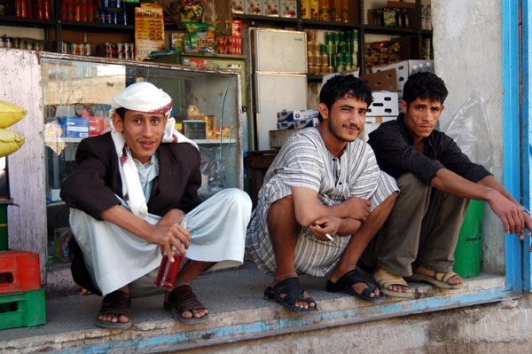 Three guys in a shop near Sulieman's flat
