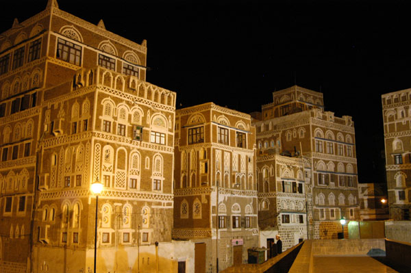 Part of Old Town Sana'a along the Sa'ila, illuminated at night
