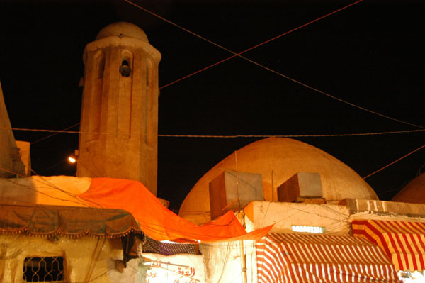 A small mosque in the souq of Sana'a Old Town at night