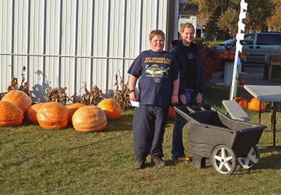 Mick and Mack Hauling Their Pumpkins in for Weighing
