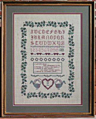 A Winters basket sampler cross stitch on linen.jpg