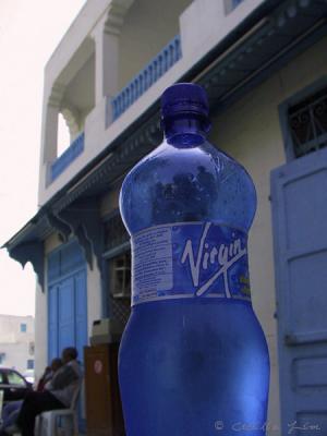Blue Soda Bottles For A Blue Village