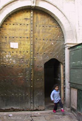 u48/cecilialim/medium/35542818.Tunis.N.Med.GirlRunOut.Door.jpg