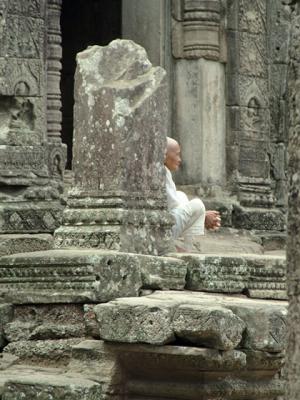 Cambodia-Angkor Thom-The Bayon-Buddist Nun Meditation