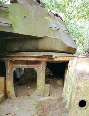 Land mine blew-up in the center of the tank.