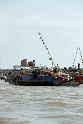 The types of produce forsale are desplayed on the poles