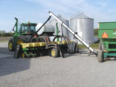 Filling the hoppers with soybean seed.JPG