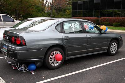 It's a joyous time, let's drag some cans behind our car.