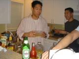 cheng with his tupperware of juice and alcohol