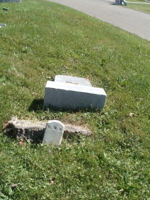 pg_41- View of Fallen Headstone & Marker & Road by Cemetery