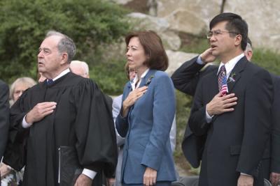 From Left: Judge Beezer, Senator Cantwell and Governer Locke during the National Anthem.