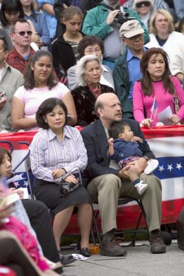 Proud parents and the youngest citizen sworn in at the ceremony.