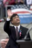 Washington State Governor Gary Locke waves to the crowd as he is introduced.