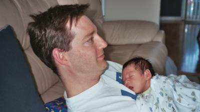 Evan catching a little snooze on Papa's chest