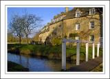 Footbridge and river, Lower Slaughter, Gloucestershire