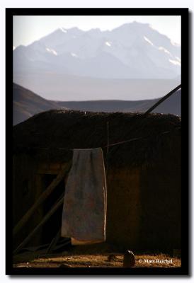 Mud Barn and Snow-Capped Mountain, Bolivia