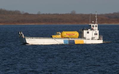 Barge Manitou II bringing propane truck back to Moosonee from Moose Factory