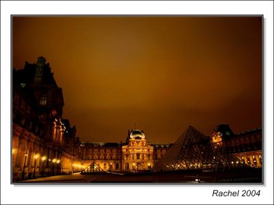 Le Louvre museum at night, Paris