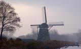 Mill in foggy weather