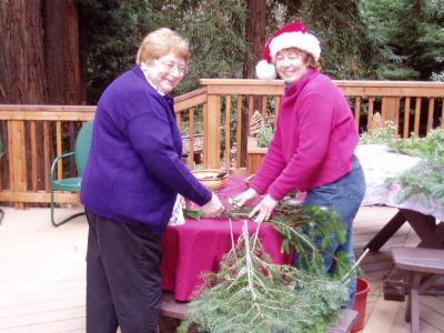Janet and Cathy getting the wreaths started
