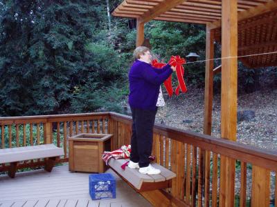 Janet hangs bows