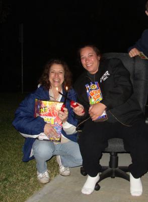u48/tikkiman/medium/30945338.1_KateandDeniseeachholdingtheirprimopyropacks.jpg