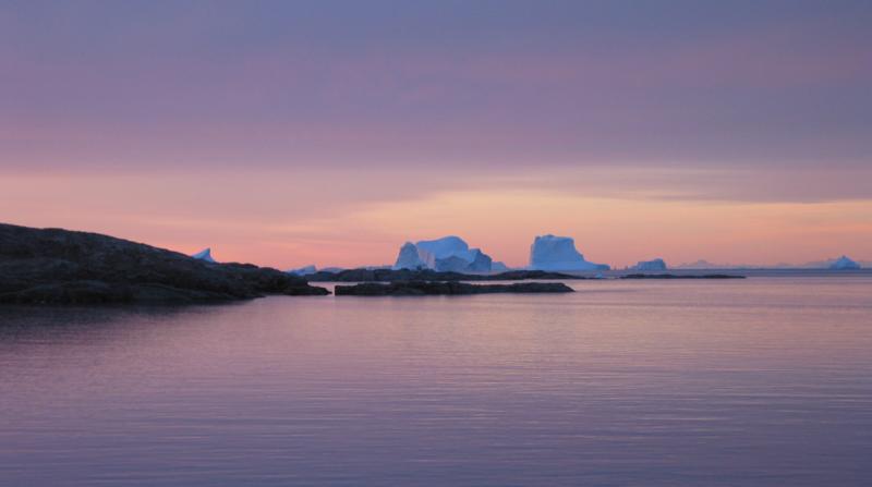Blues, yellows and mauve Sunrise with Icebergs, and Mountains