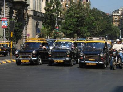 Taxis at a stop light