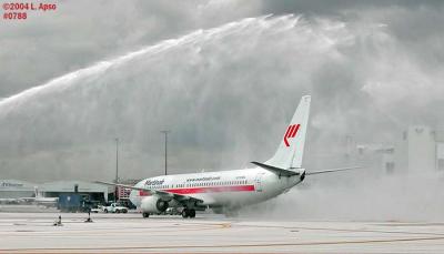 Water cannon salute for Martinair B737-81Q N732MA (operated by Miami Air International) photo #0788