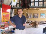 Irfan Olmez, photographer-guide inside his store.